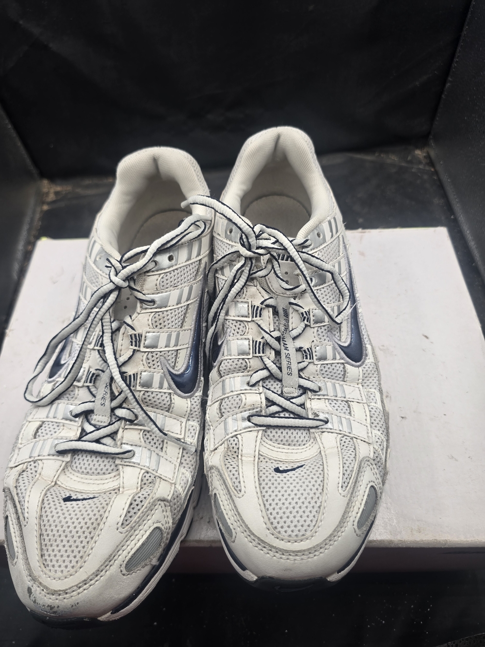 Nike White Low-Top Sneakers with Black Trim‎